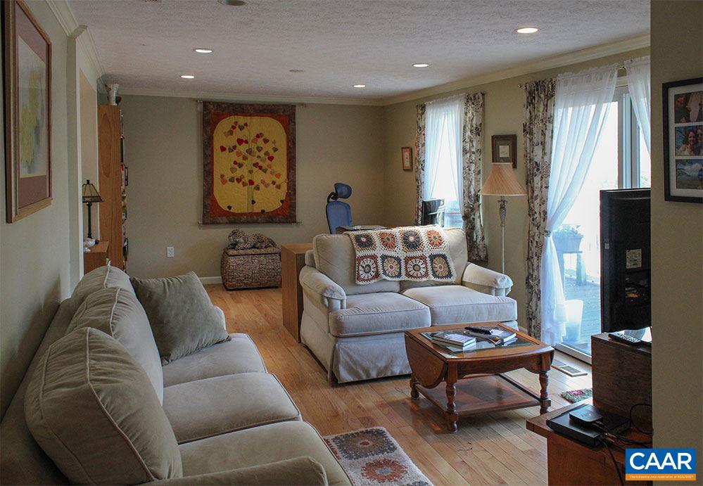 2468 Craigs Store Road Afton, VA 22920 - Photo 6 of 24 a living room with furniture and a rug