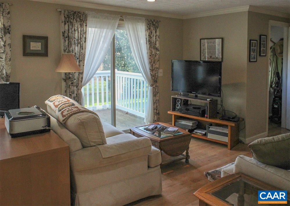 2468 Craigs Store Road Afton, VA 22920 - Photo 7 of 24 a living room with furniture and a flat screen tv