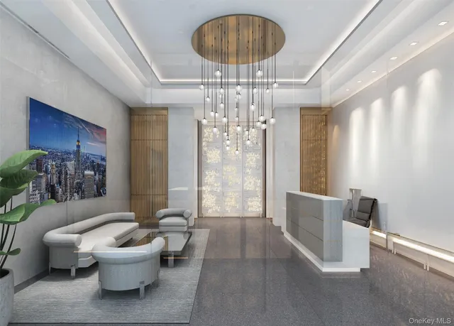 a living room with furniture and a chandelier