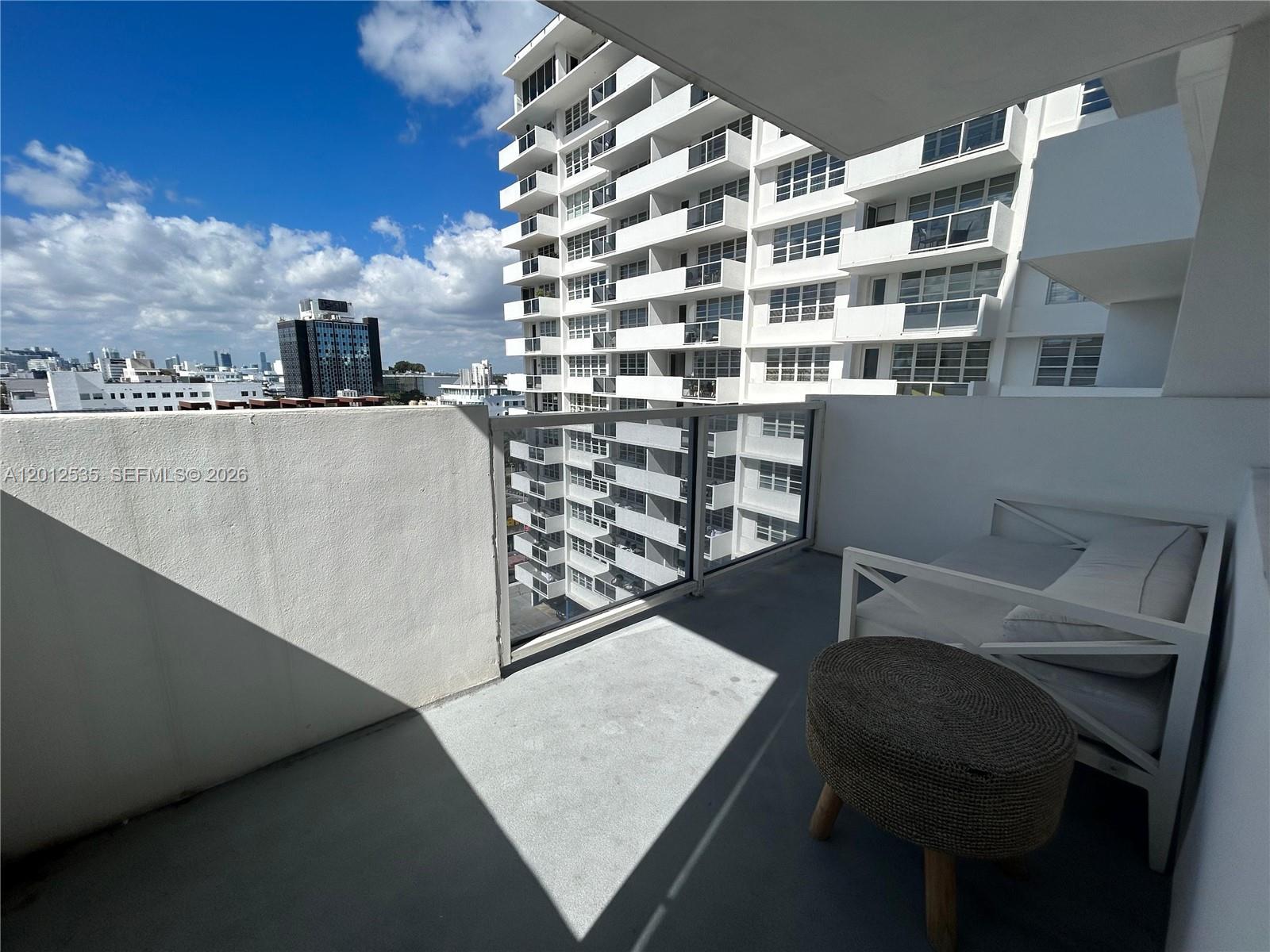 100 Lincoln Road, Unit 922 Miami Beach, FL 33139 - Photo 9 of 9 a view of balcony with furniture