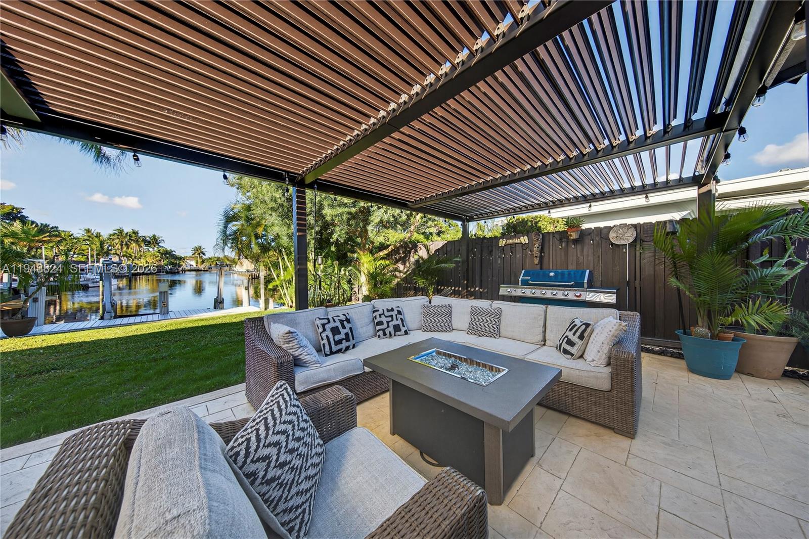 371 Southeast 3rd Street Pompano Beach, FL 33060 - Photo 27 of 87 a view of an outdoor sitting space