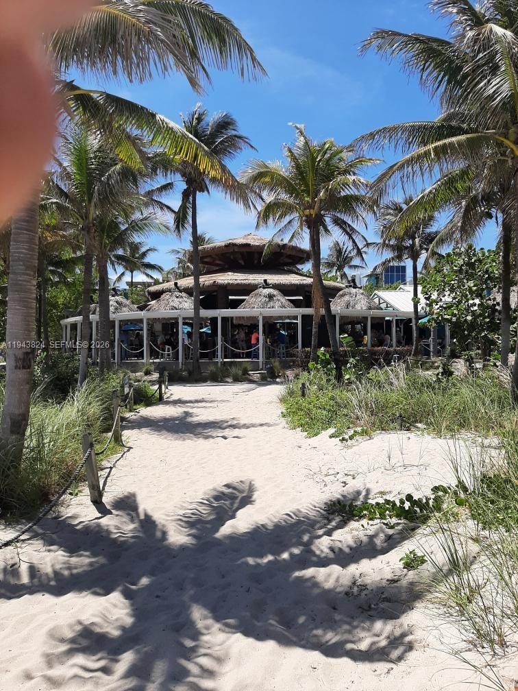 371 Southeast 3rd Street Pompano Beach, FL 33060 - Photo 83 of 87 a view of a house with a patio