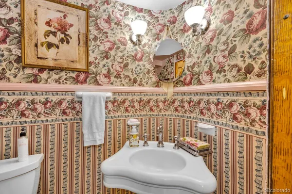 a bathroom with a toilet and a sink