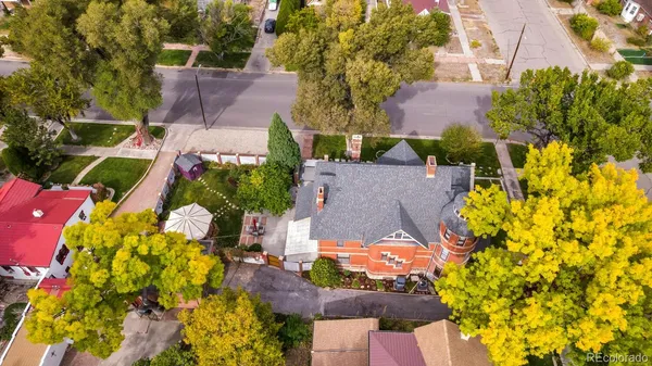 an aerial view of residential house with outdoor space