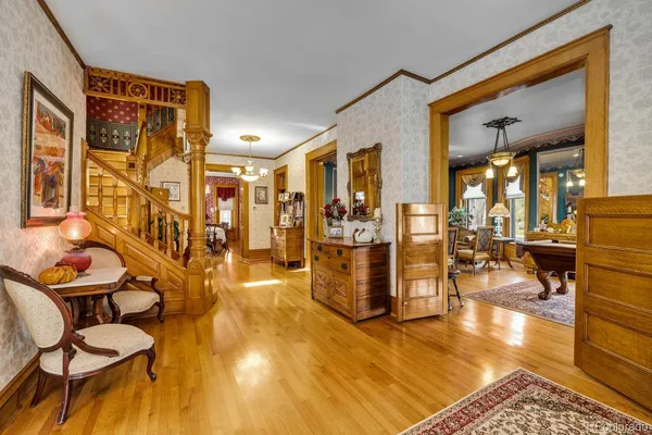 a view of a livingroom with furniture and a window