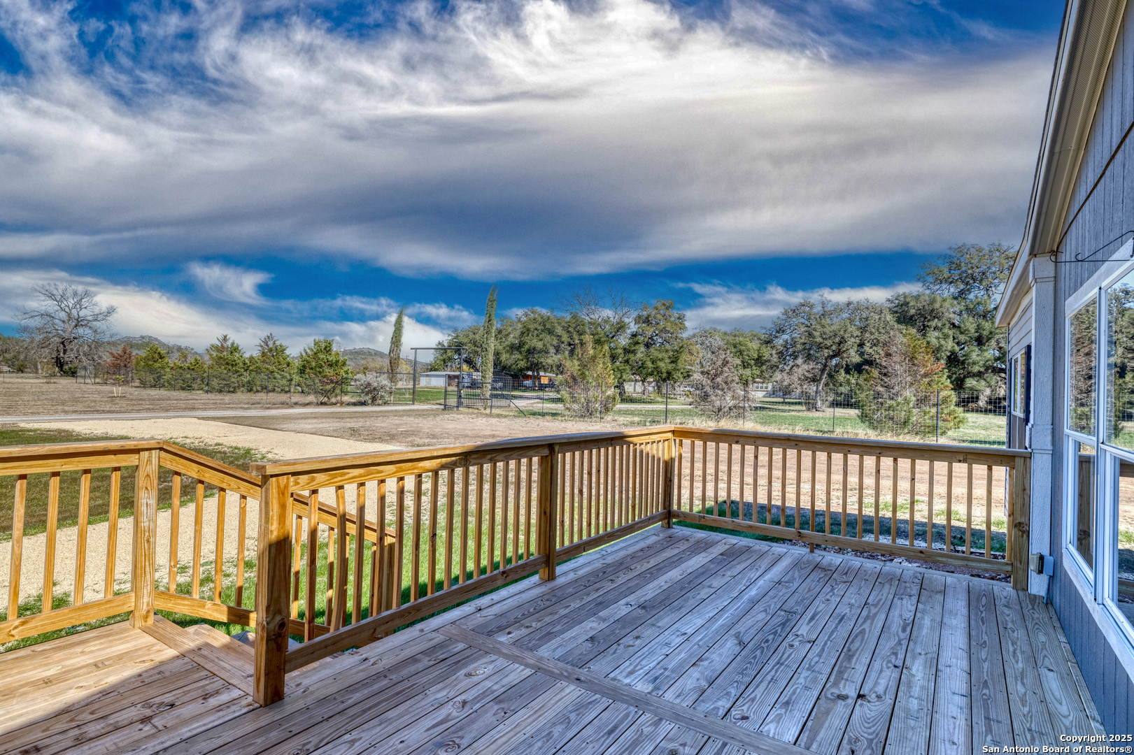 130 River Vly Road Rio Frio, TX 78879 - Photo 11 of 28 a view of a balcony with wooden floor