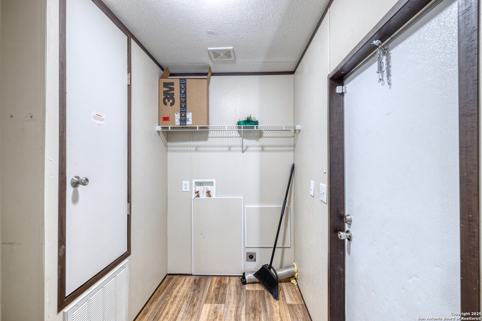 130 River Vly Road Rio Frio, TX 78879 - Photo 14 of 28 a view of kitchen with furniture and wooden floor