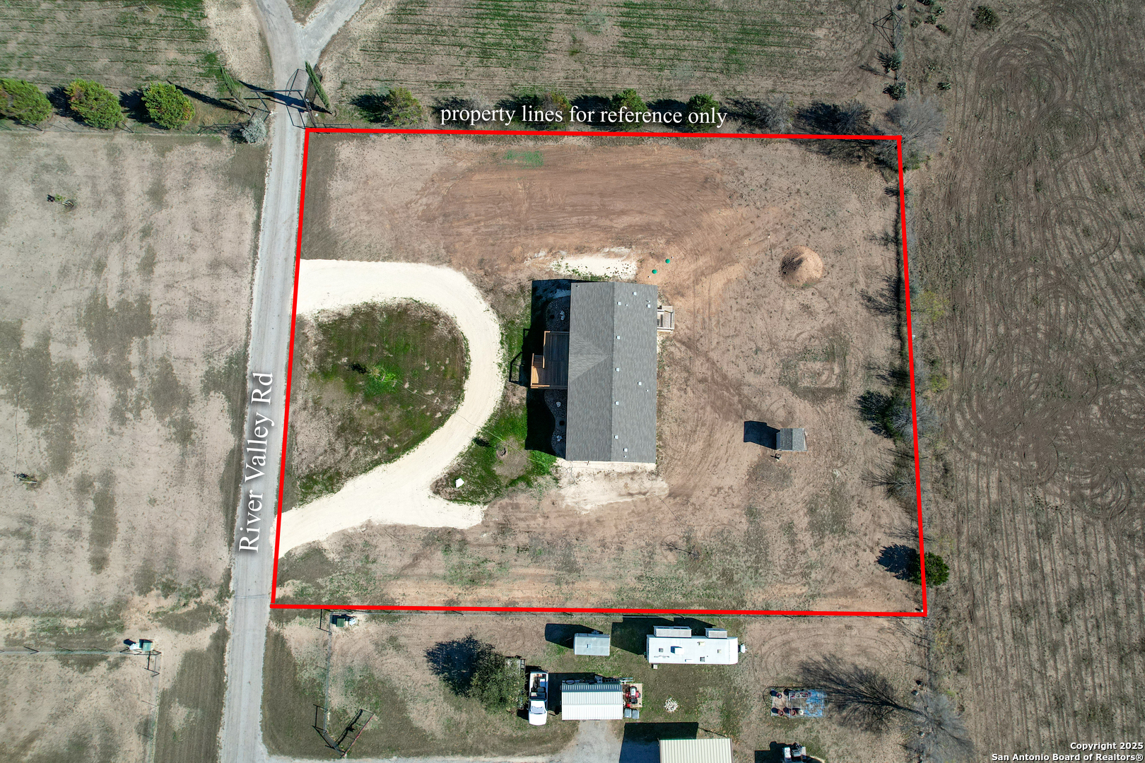 130 River Vly Road Rio Frio, TX 78879 - Photo 4 of 28 an aerial view of a residential houses with outdoor space