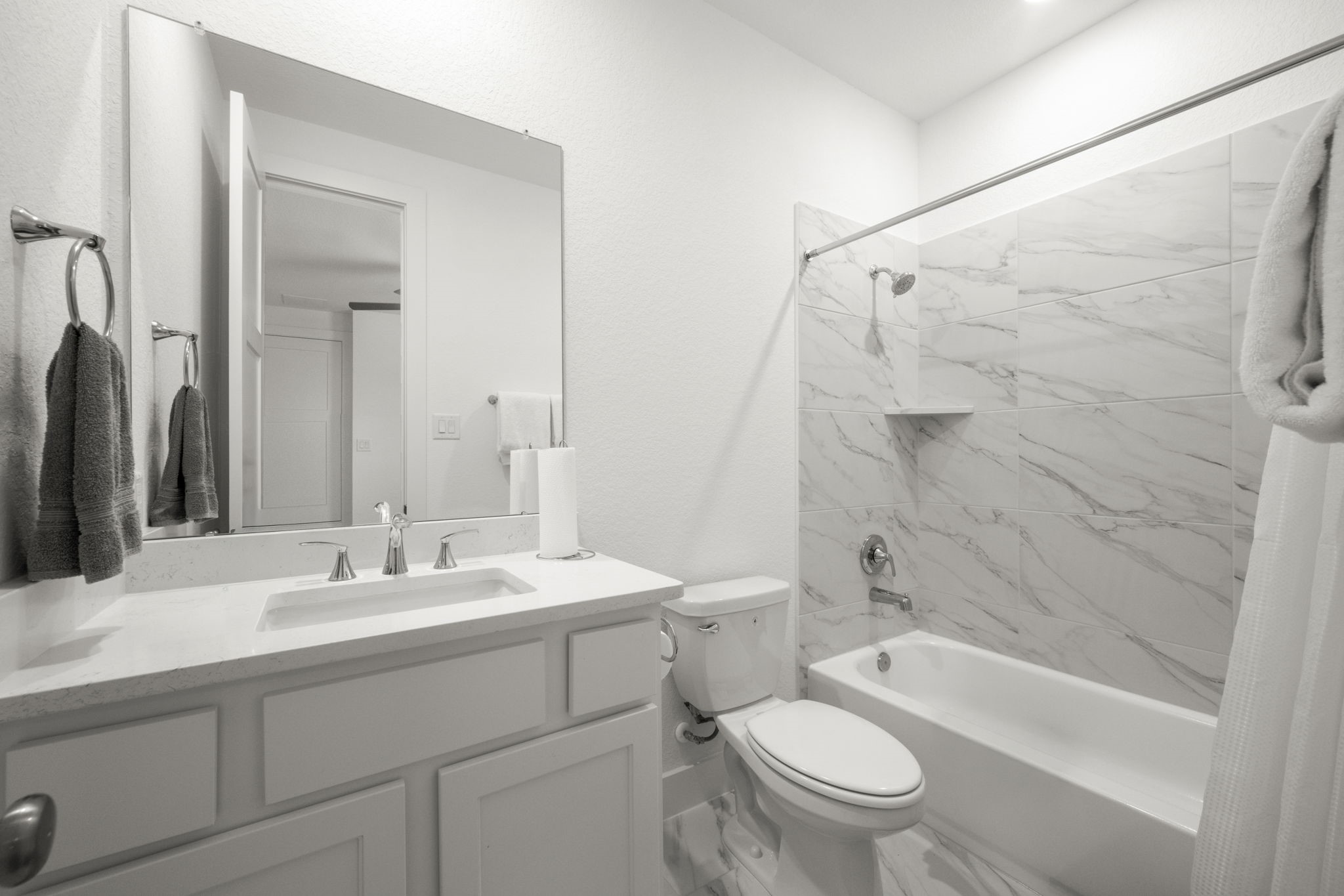 13035 Wandering Rdg Lane Conroe, TX 77302 - Photo 21 of 28 a bathroom with a sink a toilet and shower