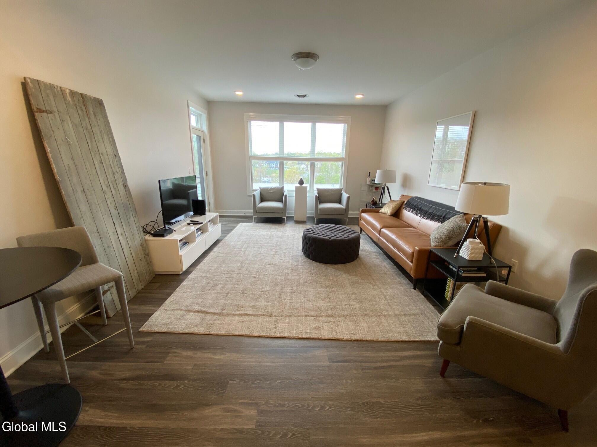 130 Excelsior Avenue, Unit 414 Saratoga Springs, NY 12866 - Photo 8 of 15 Living Room 2