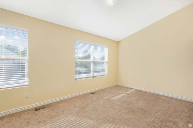7936 Wycliffe Way Eagle Mountain, UT 84005 - Photo 12 of 37 Unfurnished room featuring carpet flooring and baseboards