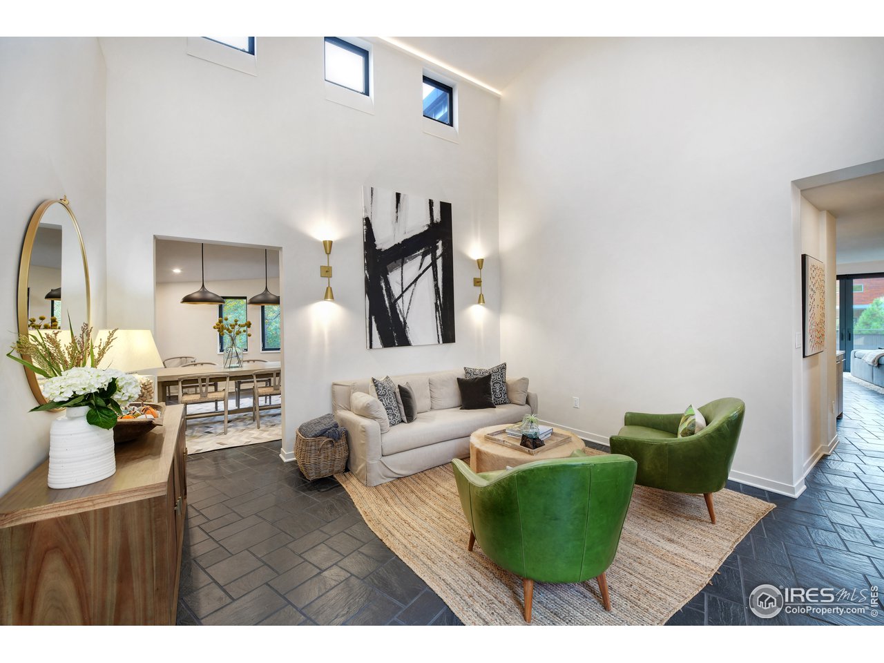 505 Geneva Avenue Boulder, CO 80302 - Photo 17 of 40 a living room with furniture and wooden floor