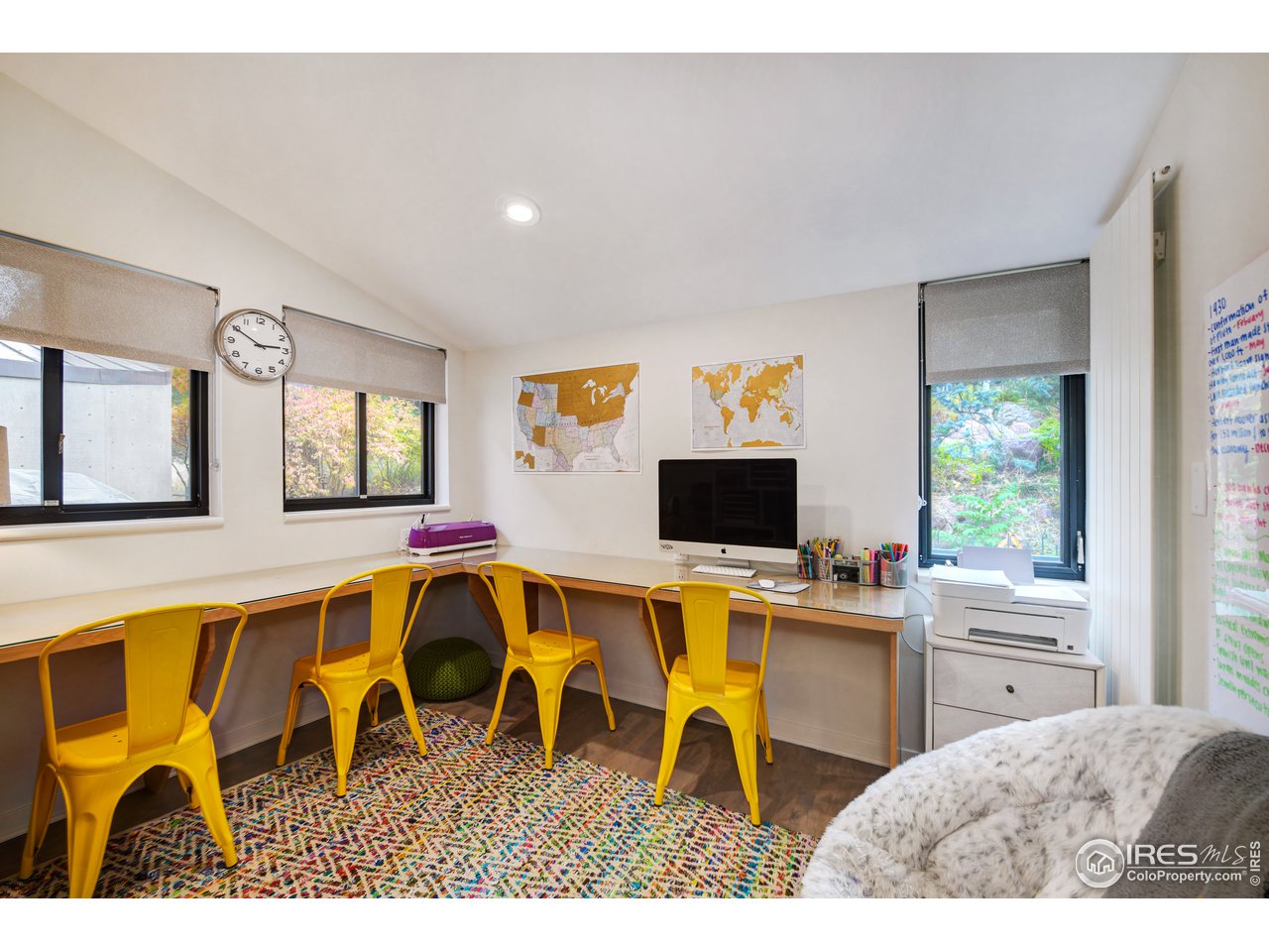 505 Geneva Avenue Boulder, CO 80302 - Photo 20 of 40 a view of a dining room with furniture and a flat screen tv