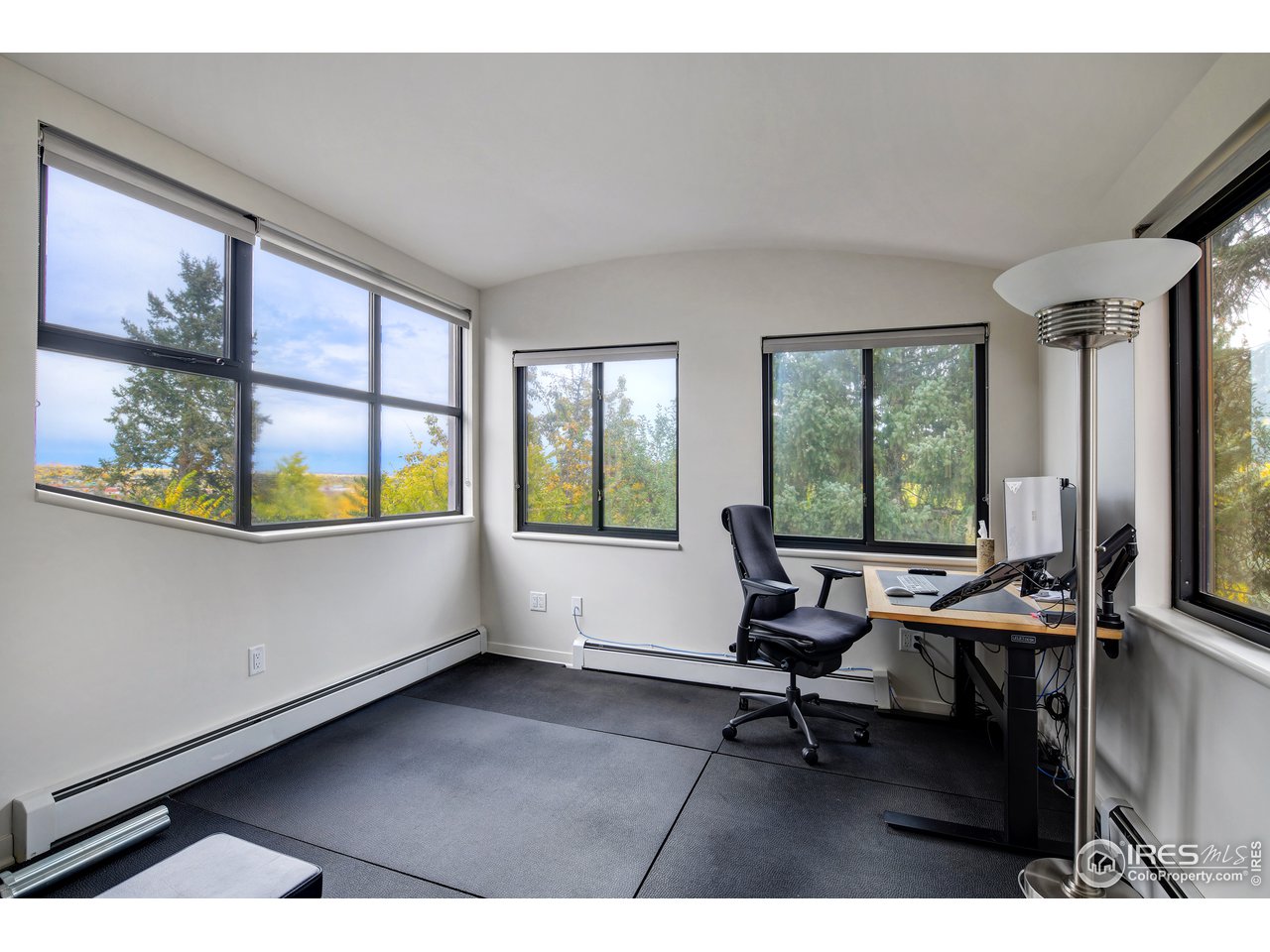 505 Geneva Avenue Boulder, CO 80302 - Photo 25 of 40 a living room with furniture and a large window