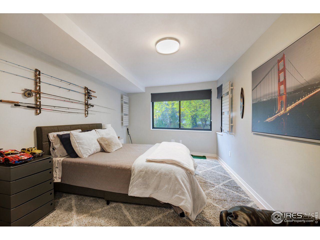 505 Geneva Avenue Boulder, CO 80302 - Photo 29 of 40 a bedroom with a bed and a window