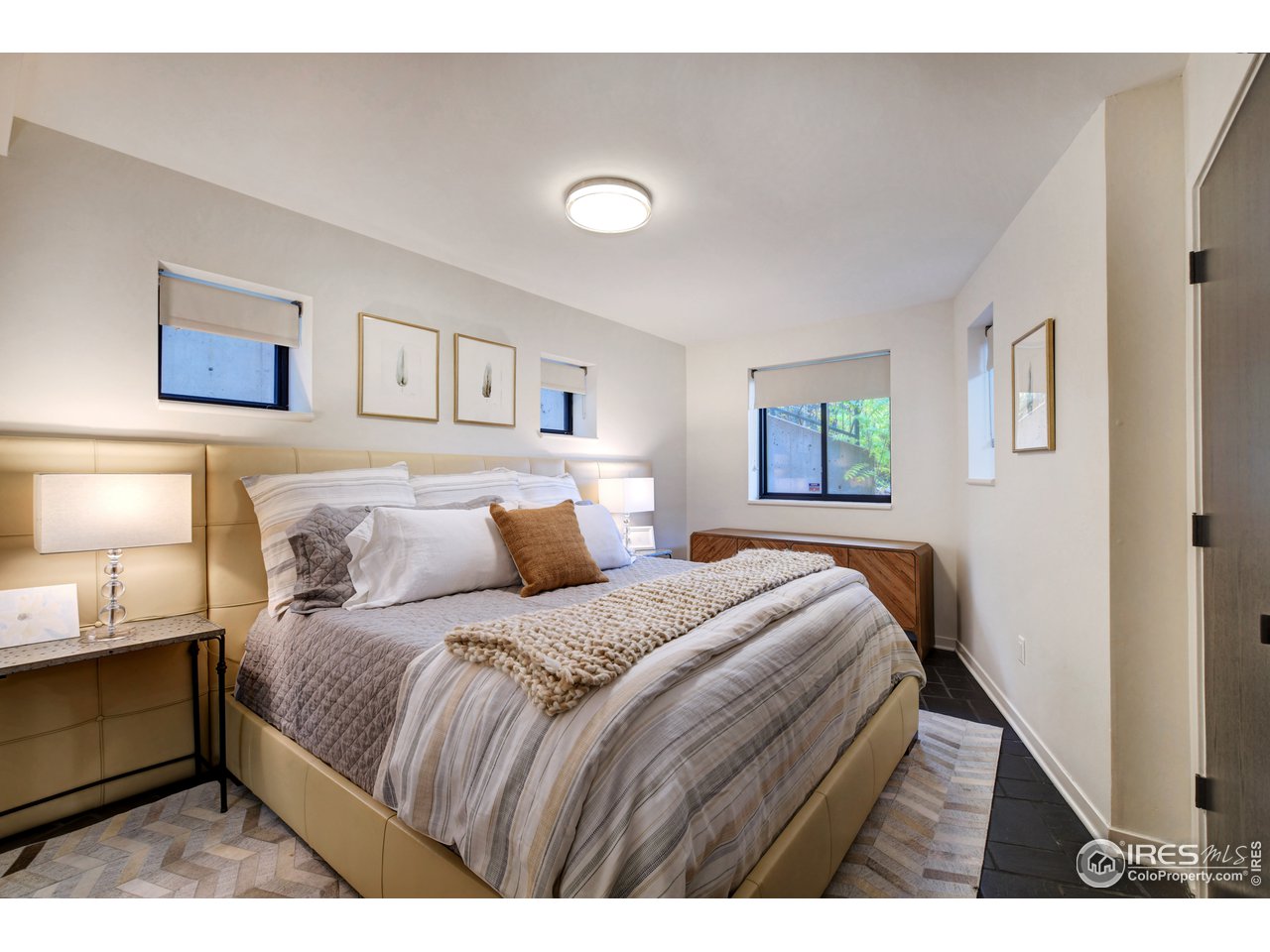 505 Geneva Avenue Boulder, CO 80302 - Photo 31 of 40 a bedroom with a bed and a night stand
