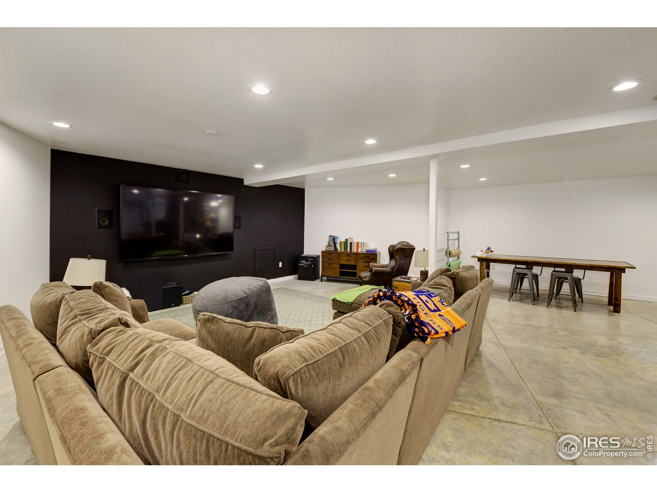 505 Geneva Avenue Boulder, CO 80302 - Photo 36 of 40 a living room with furniture and a flat screen tv