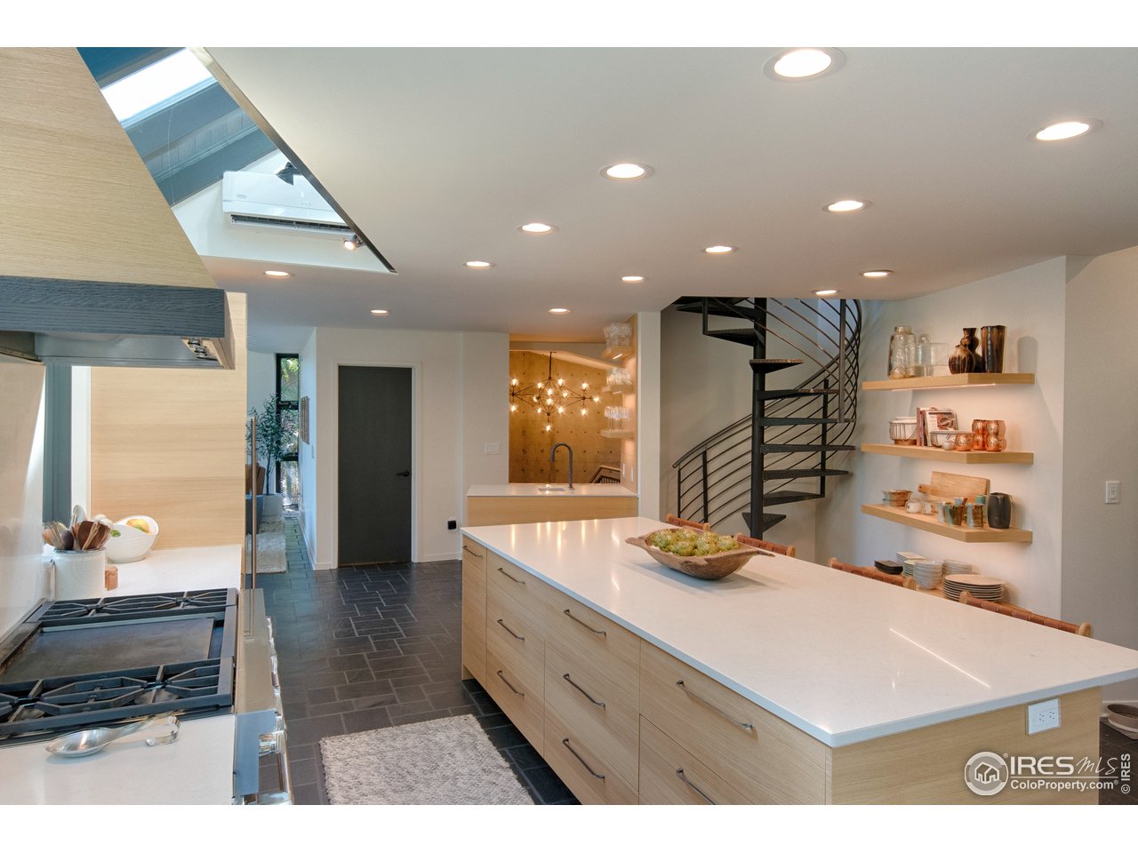 505 Geneva Avenue Boulder, CO 80302 - Photo 7 of 40 a kitchen with stainless steel appliances granite countertop a sink counter space and living room view