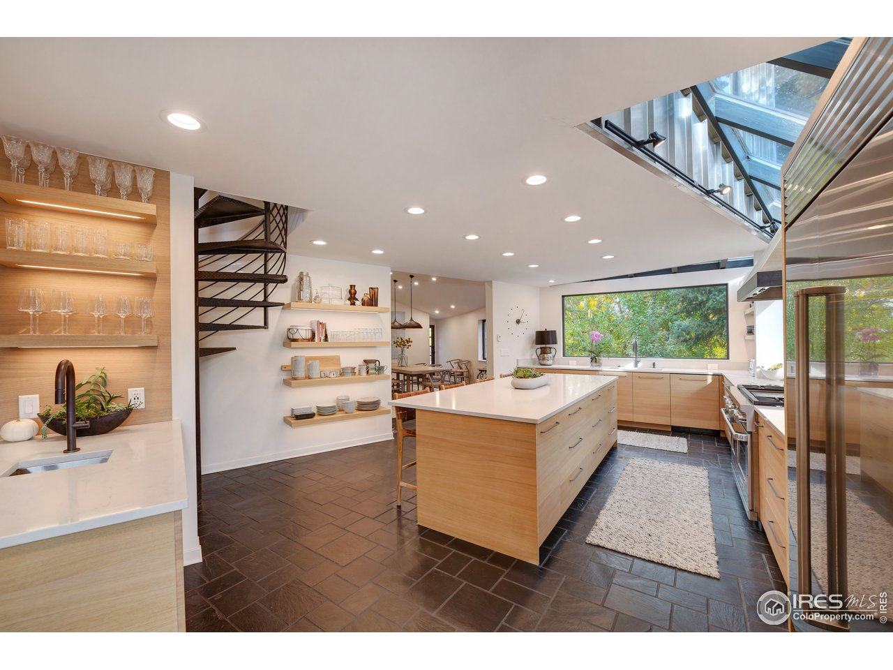505 Geneva Avenue Boulder, CO 80302 - Photo 8 of 40 a view of kitchen with stainless steel appliances cabinets and wooden floor