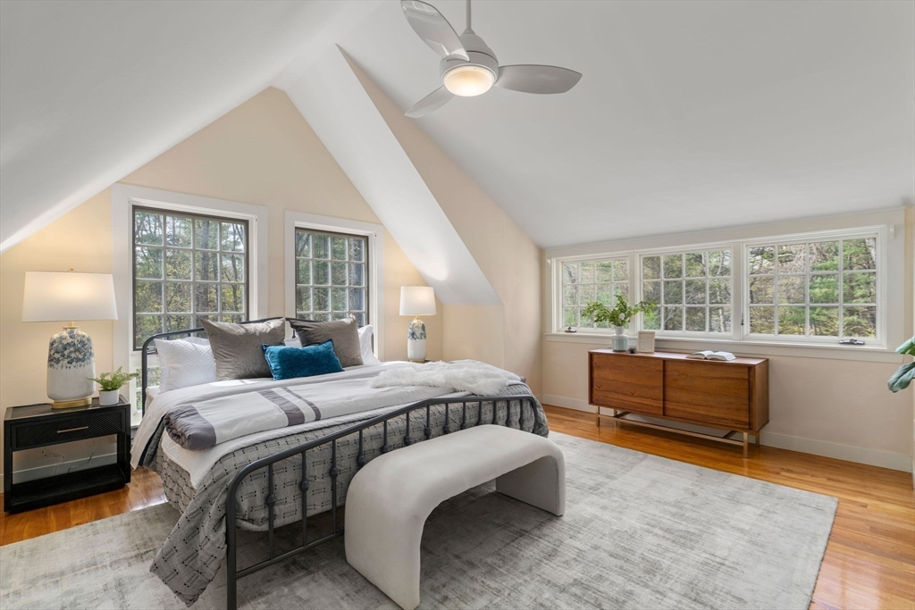 8 Todd Pond Road Lincoln, MA 01773 - Photo 16 of 29 a bedroom with a bed and a large window