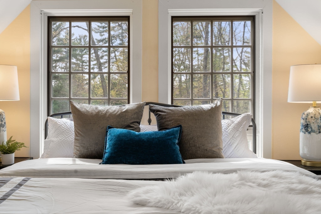 8 Todd Pond Road Lincoln, MA 01773 - Photo 17 of 29 a living room with furniture and large windows