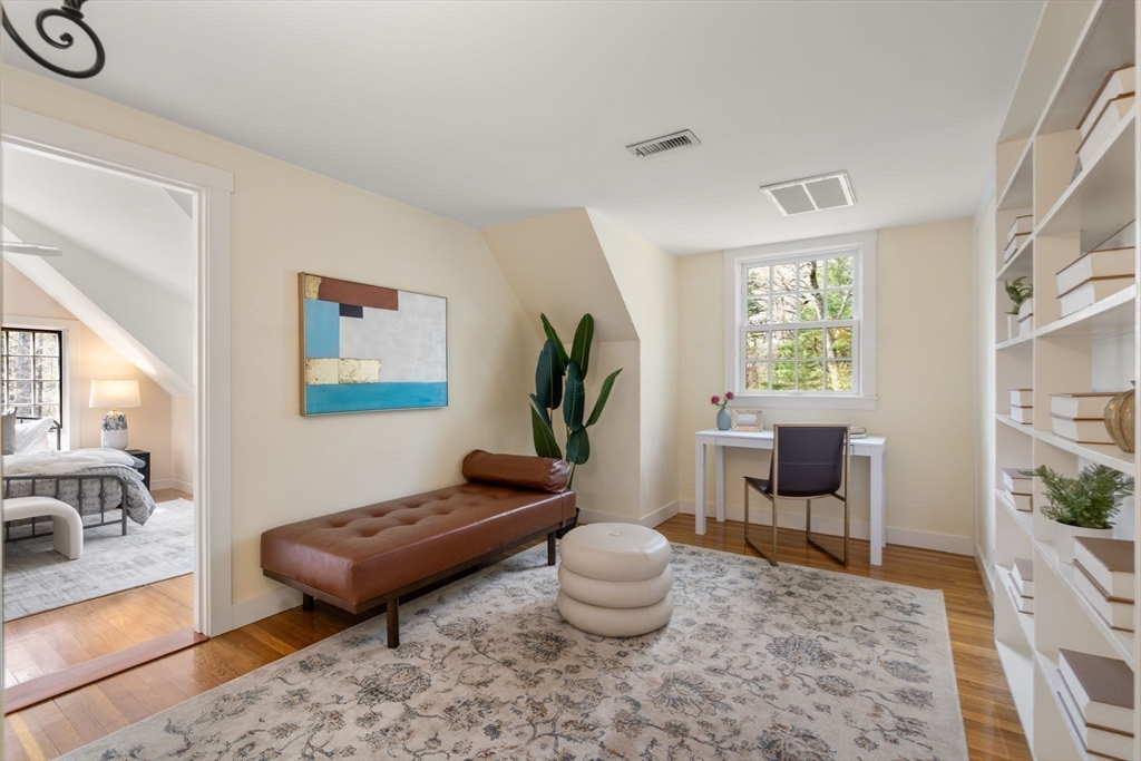 8 Todd Pond Road Lincoln, MA 01773 - Photo 18 of 29 a living room with furniture and a potted plant