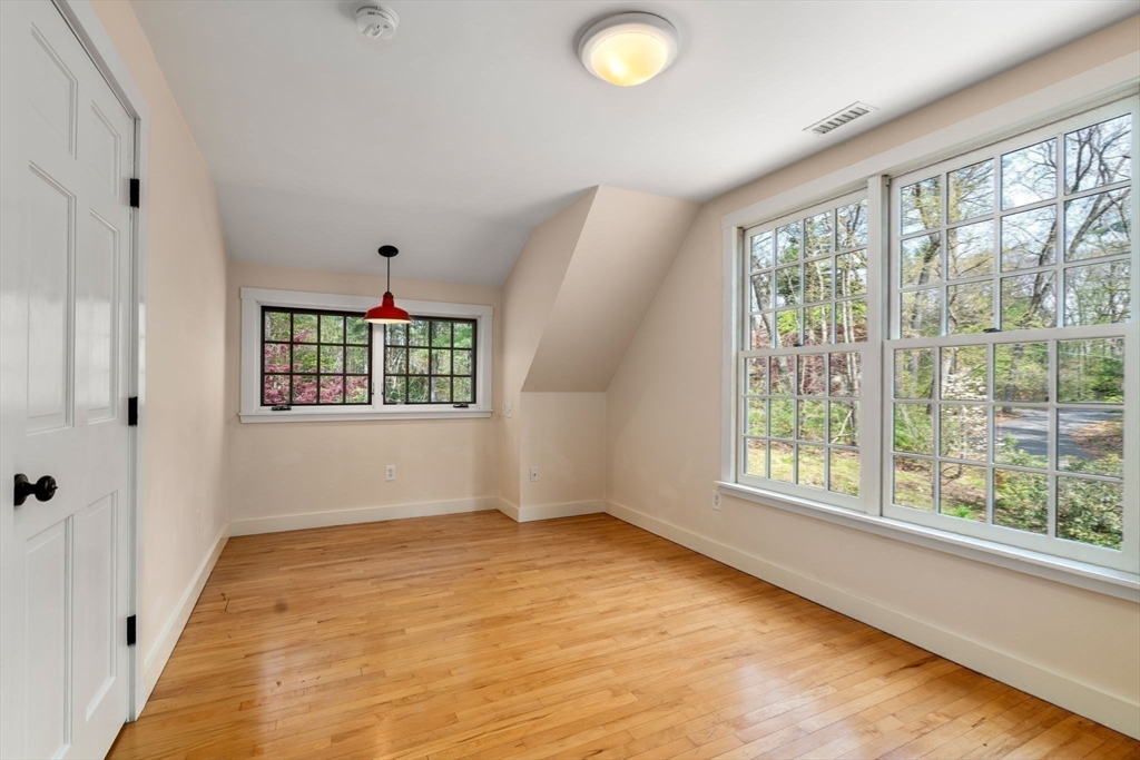 8 Todd Pond Road Lincoln, MA 01773 - Photo 24 of 29 a view of an empty room with a window