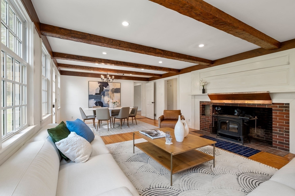 8 Todd Pond Road Lincoln, MA 01773 - Photo 10 of 29 a living room with furniture and a fireplace