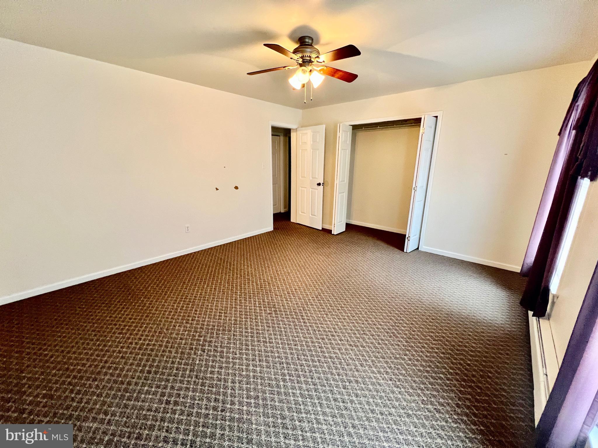 107 Centre Street Ashland, PA 17921 - Photo 13 of 32 a view of an empty room with a window