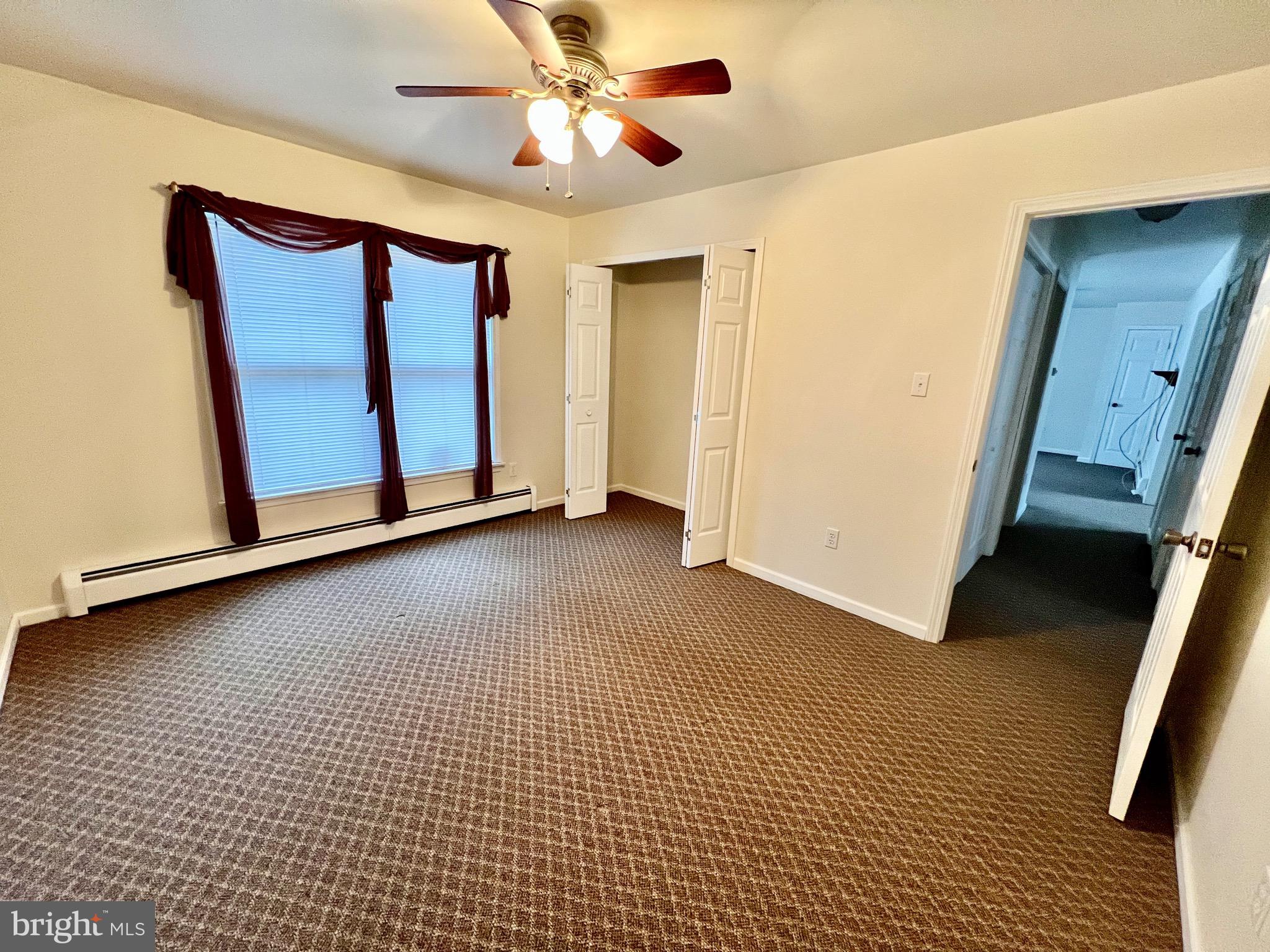 107 Centre Street Ashland, PA 17921 - Photo 14 of 32 a view of an empty room with a window