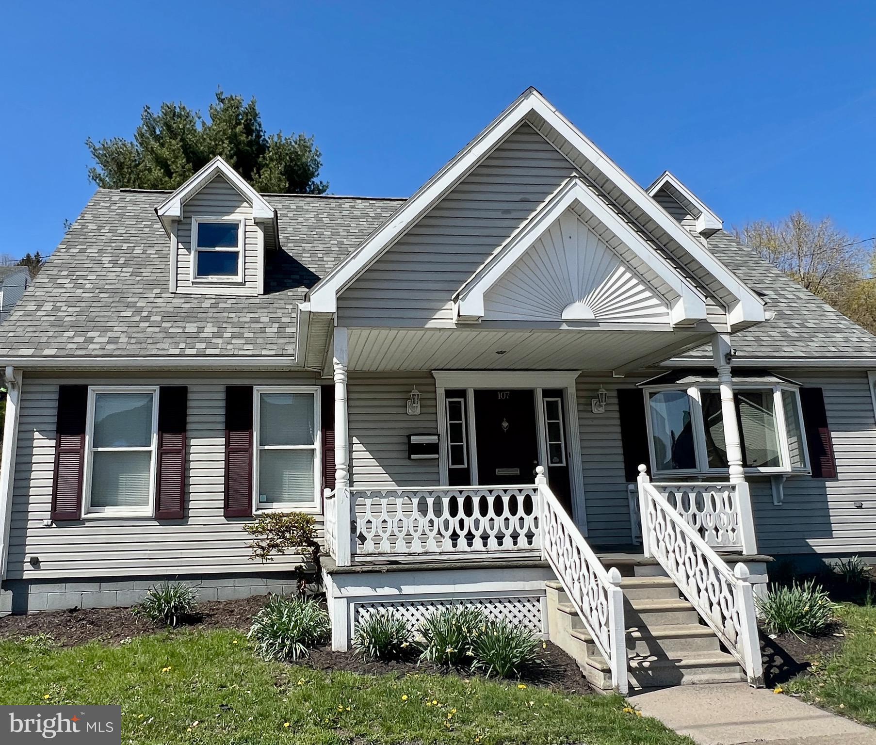 107 Centre Street Ashland, PA 17921 - Photo 2 of 32 front view of a house with a yard
