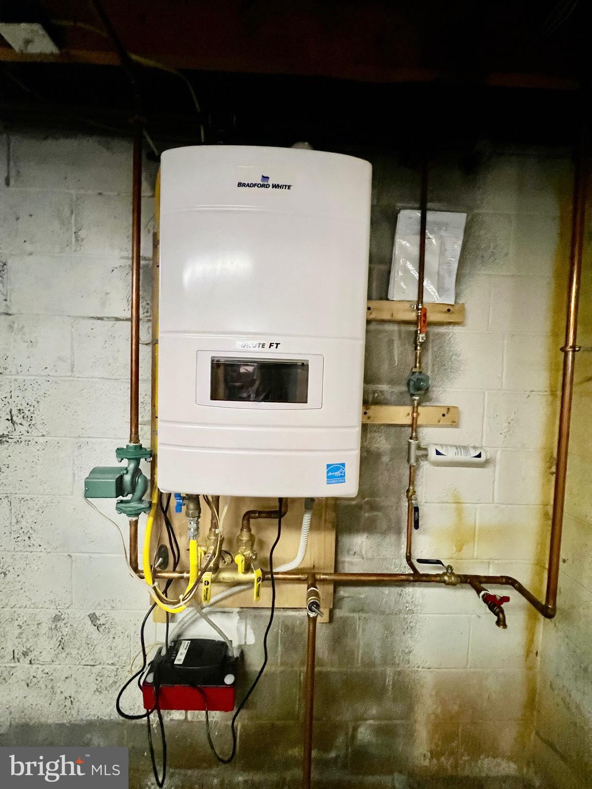 107 Centre Street Ashland, PA 17921 - Photo 21 of 32 a picture of water heater room