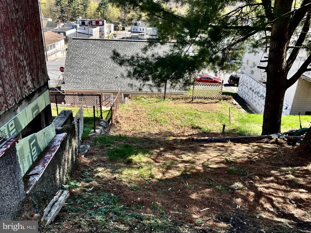 a view of balcony with wooden floor