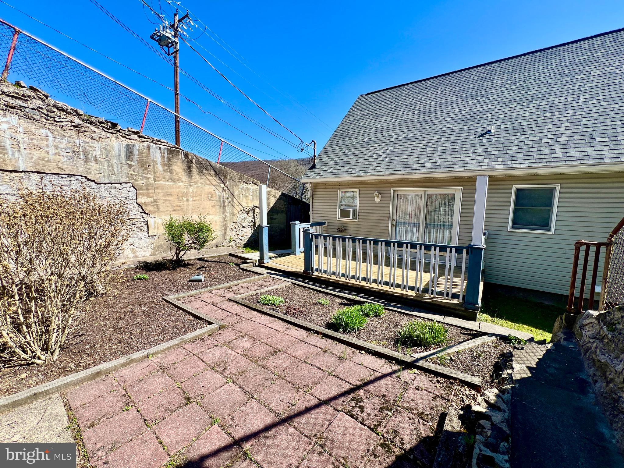 107 Centre Street Ashland, PA 17921 - Photo 31 of 32 a view of a house with a yard