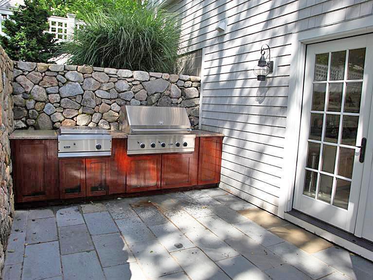 66 Tern Lane Centerville, MA 02632 - Photo 4 of 11 a view of a backyard of the house