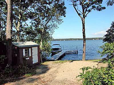 66 Tern Lane Centerville, MA 02632 - Photo 6 of 11 a front view of a house with a yard