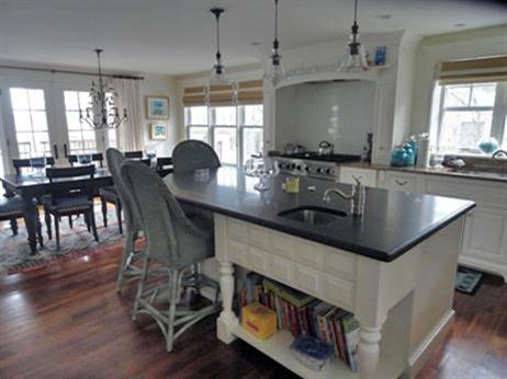 66 Tern Lane Centerville, MA 02632 - Photo 8 of 11 a kitchen with sink stove and cabinets