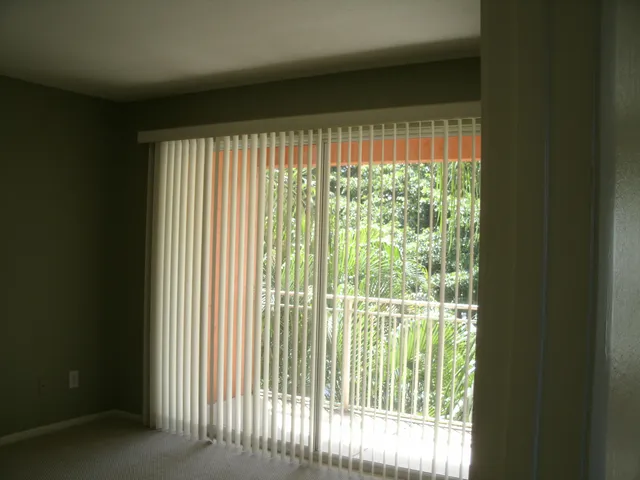 a view of a room that has a large window