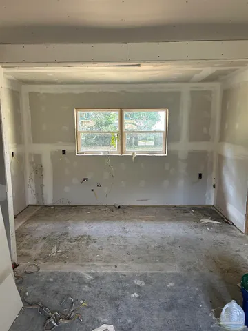 a view of a window in an empty room