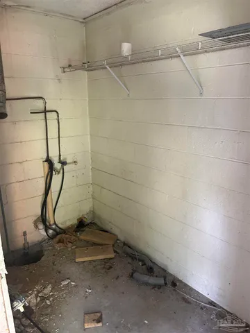 a bathroom with a sink and a window