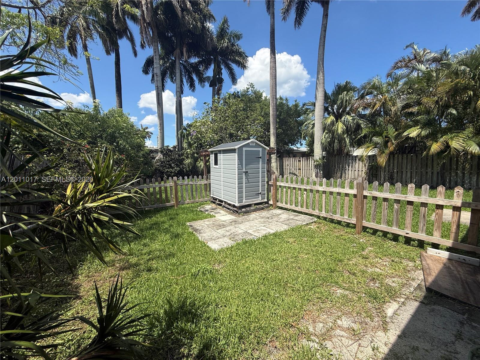 115 Southeast 2nd Street, Unit 2 Dania Beach, FL 33004 - Photo 11 of 11 a view of a yard with plants