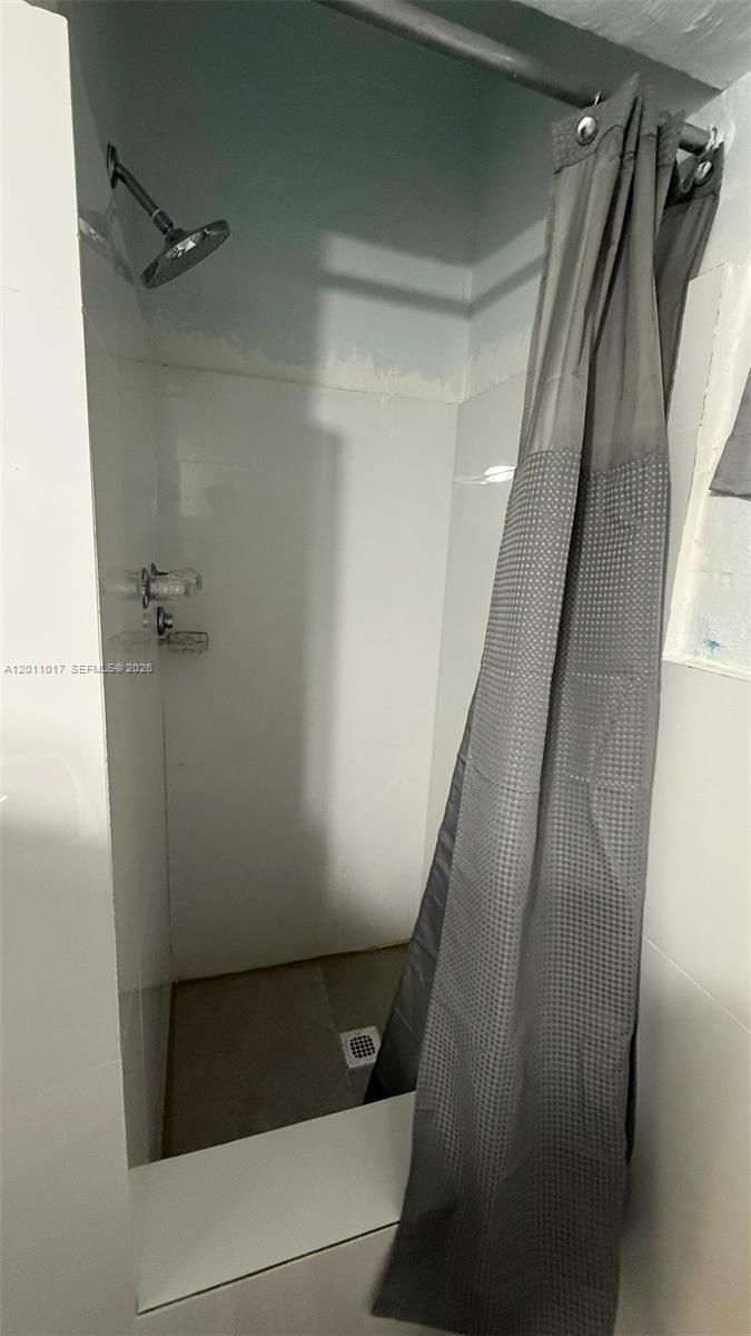 115 Southeast 2nd Street, Unit 2 Dania Beach, FL 33004 - Photo 8 of 11 a view of walk in closet