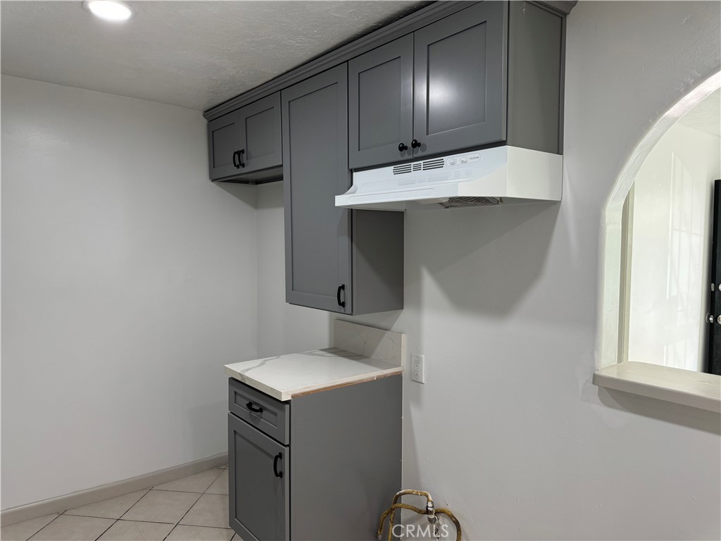 5263 35th Street Jurupa Valley, CA 92509 - Photo 11 of 19 a room with storage and utility