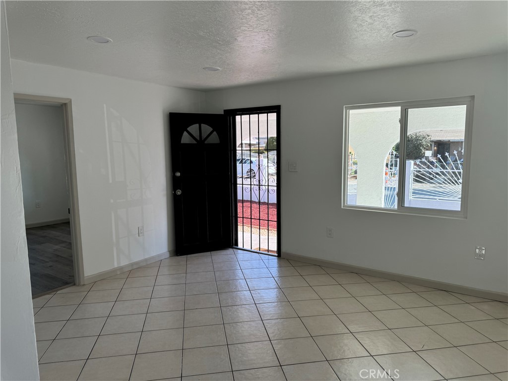 5263 35th Street Jurupa Valley, CA 92509 - Photo 6 of 19 a view of an empty room and window