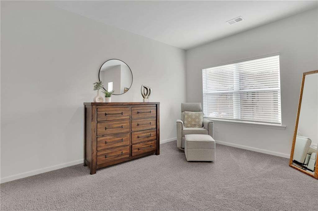 803 Dundee Way Cartersville, GA 30121 - Photo 25 of 37 a living room with furniture and a window