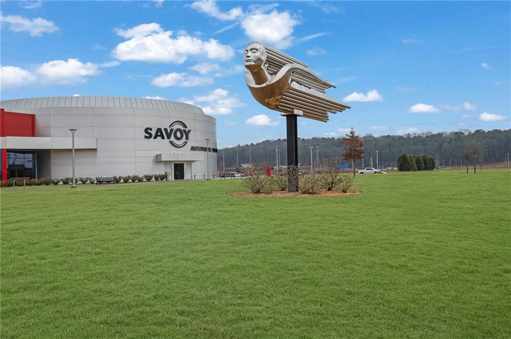 803 Dundee Way Cartersville, GA 30121 - Photo 35 of 37 a front view of a house with garden