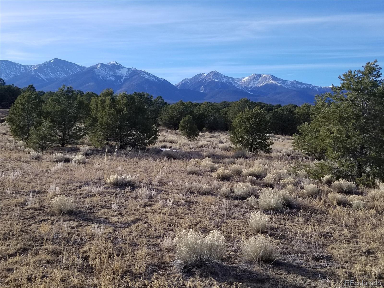 10761 Sawatch Range Road Salida, CO 81201 - Photo 20 of 36 a view of a town with mountains in the background