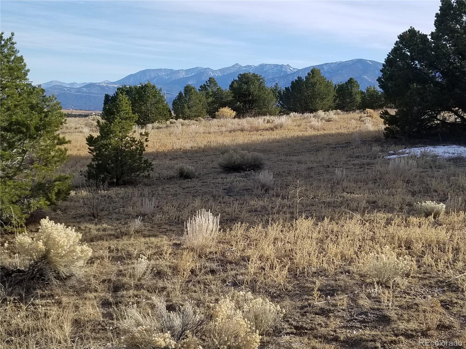 10761 Sawatch Range Road Salida, CO 81201 - Photo 25 of 36 a view of dirt road with a building in the background