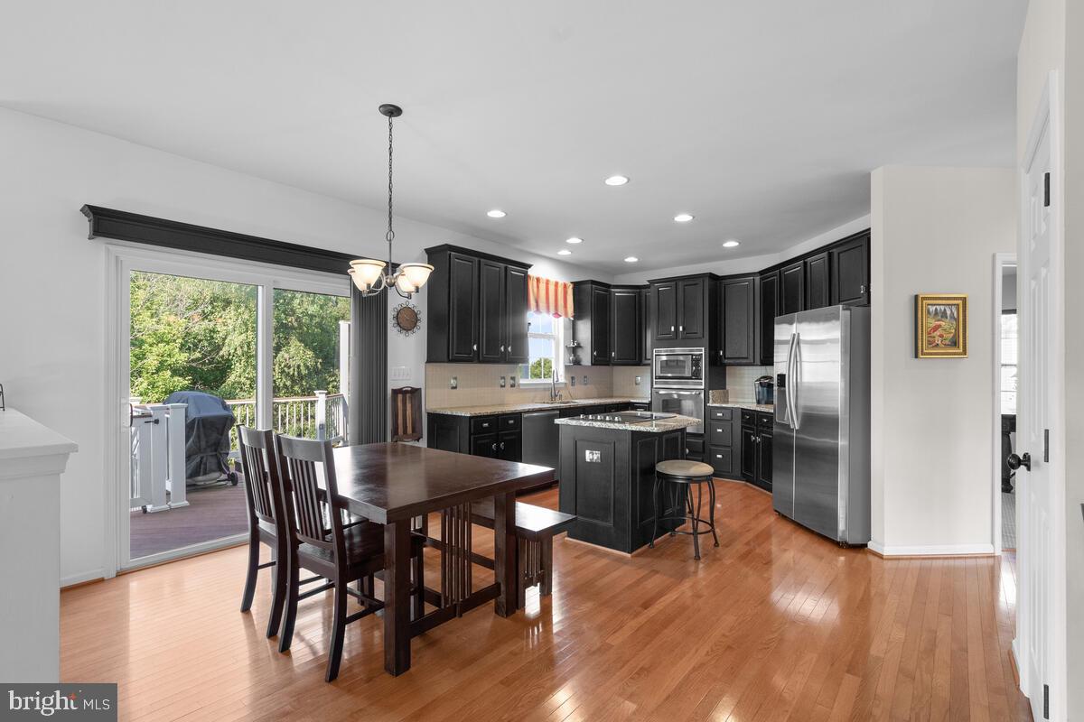 18502 Crossview Road Boyds, MD 20841 - Photo 13 of 68 Table Space Kitchen with Deck Access