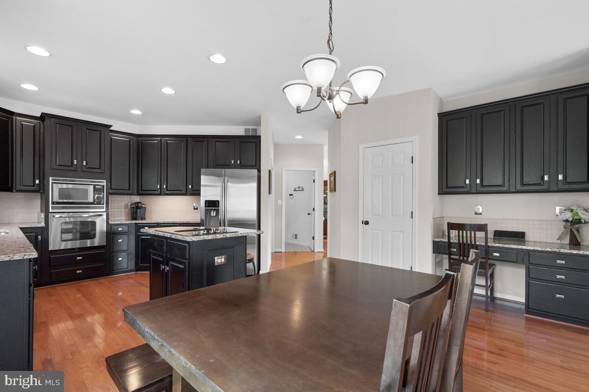 18502 Crossview Road Boyds, MD 20841 - Photo 16 of 68 Table Space Kitchen with Deck Access